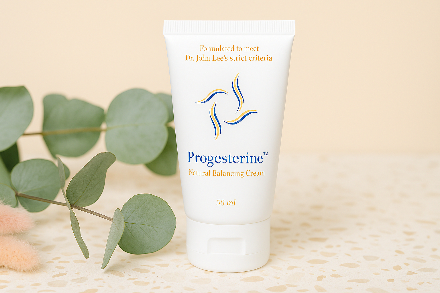 foto van een tube progesteron crème met plant erbij